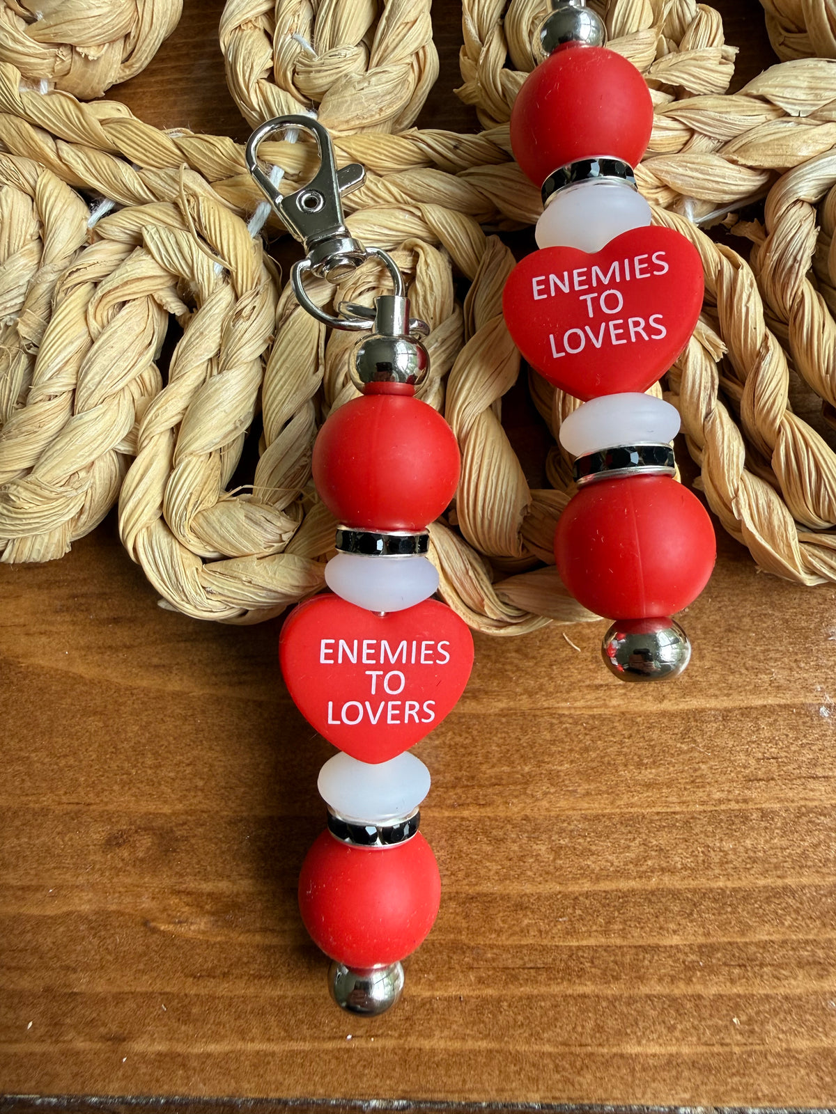 Enemies to lovers tethered charm