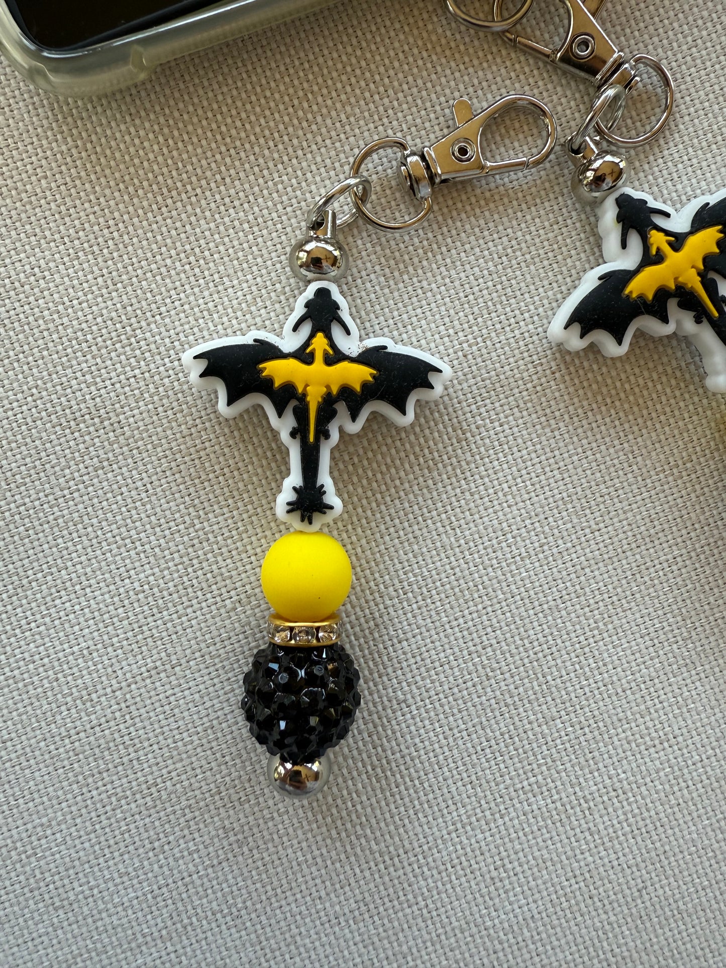 Double Dragon Tethered Charm