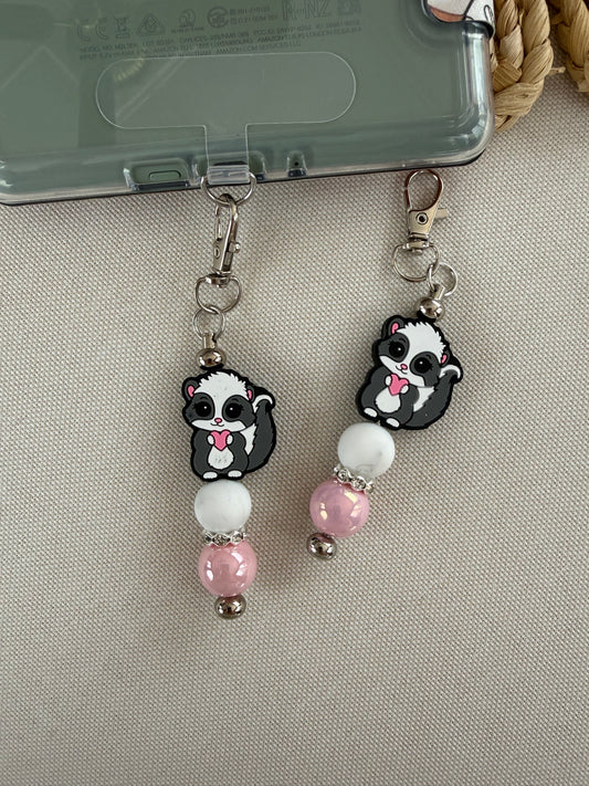 Cutie Skunk Tethered Charm