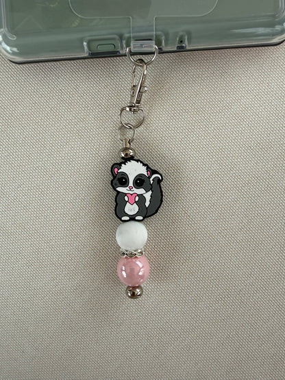 Cutie Skunk Tethered Charm