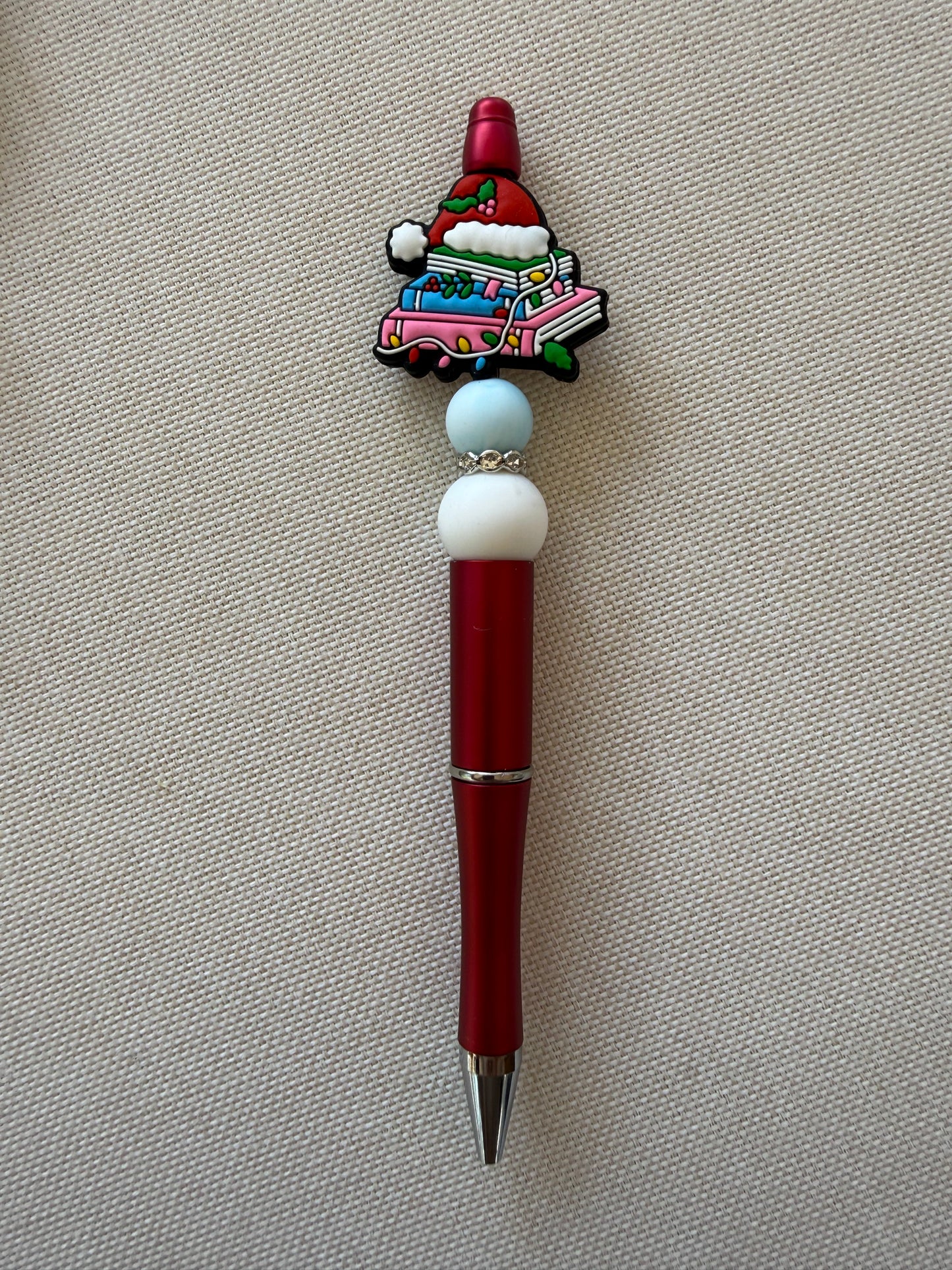 Santa Hat Book stack Pen